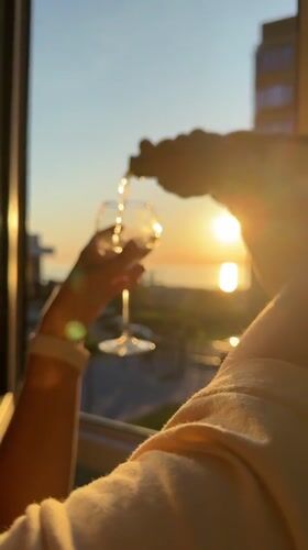 Sunset wine moment captured in Anapa overlooking Black Sea