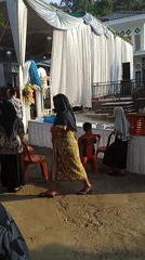 Wedding reception in full swing under a white tent in Kelurahan