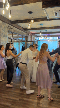 Wedding celebration with line dancing captured in Darmantsi, Bulgaria