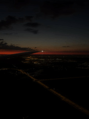 Sunset aerial view captured over illuminated Pavlovo, Russia