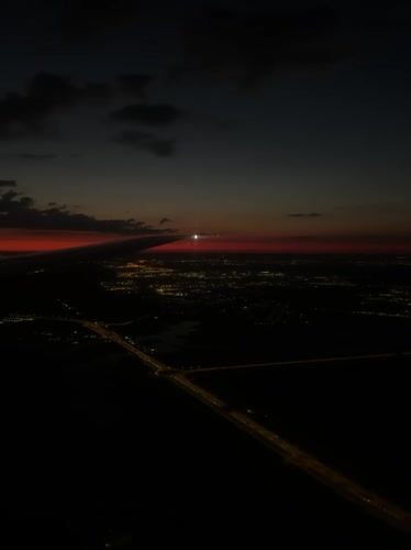 Sunset aerial view captured over illuminated Pavlovo, Russia