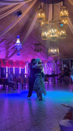 Evening social gathering with dancing, pizza observed at Pattaya venue