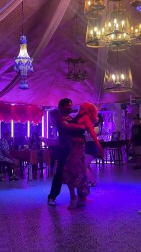 Evening social gathering with dancing, pizza observed at Pattaya venue