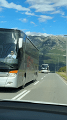 Highway travel documented near Mrčevac, Montenegro under clear skies