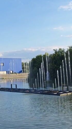 Roshen Fountain jets rising over the Vinnytsia riverfront