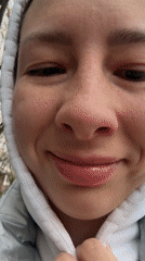 Woman films outdoor selfies in early morning Moscow