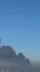 Heavy smoke rising from multiple points over Kyiv