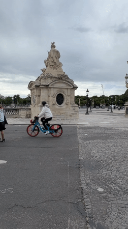 Afternoon park activity captured near Paris monument