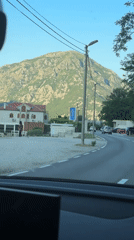 Driver records scenic mountain road journey in Morinj, Montenegro