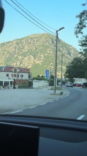 Driver records scenic mountain road journey in Morinj, Montenegro