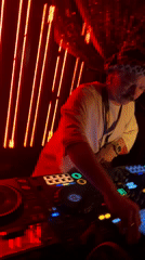 DJ performs with turntables and digital console in Belgrade