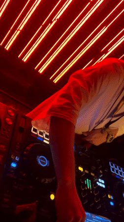 DJ performs with turntables and digital console in Belgrade