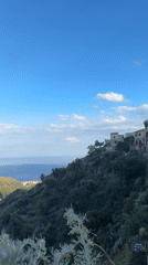 Church service documented in Mediterranean hillside village, Italy