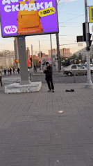 Street musician, motorcycle with Russian flag observed in Petersburg