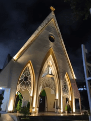 Da Lat's 'Chicken Church' at night, two angles