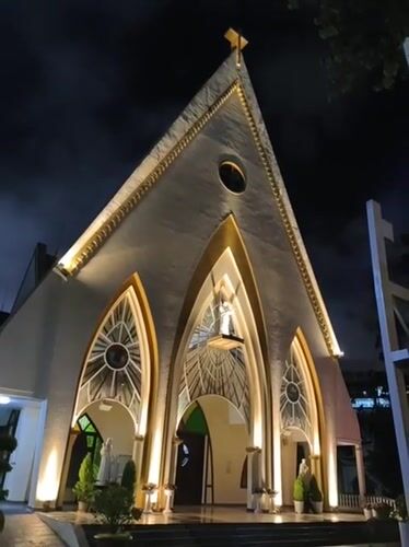 Da Lat's 'Chicken Church' at night, two angles