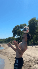 Man performs soccer tricks on Tsarevo beach morning