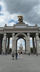 Visitor documents VDNKh landmarks including entrance arch and Ferris wheel