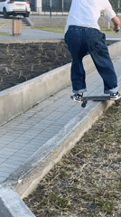 Skaters session a Krasnoyarsk street spot, prepping and riding ledges