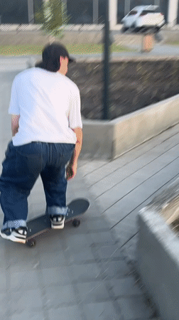 Skaters session a Krasnoyarsk street spot, prepping and riding ledges