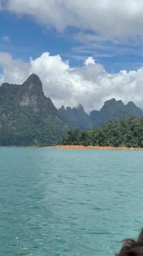Cheow Lan Lake's turquoise waters and karst peaks, Khao Phang
