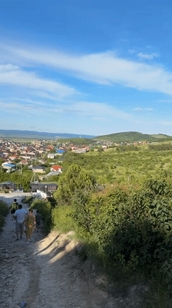 Hillside views document Supsekh village and mysterious dome structure