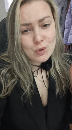 Woman takes selfie indoors in Noviy, Russia