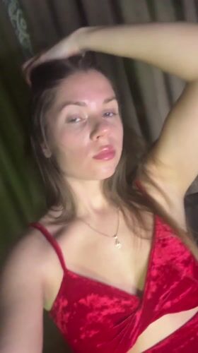 Woman films social media content in Batumi apartment