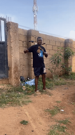 Morning routine captured in Bukuru: weapon demonstration, dog feeding