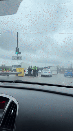 Dashcam captures road incident in rainy Rogachevka, Russia