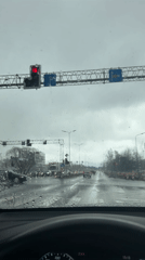 Driver documents rainy traffic stop in Rīga