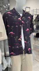 Shopping mall scenes captured in Moscow including clothing displays