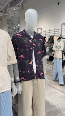 Shopping mall scenes captured in Moscow including clothing displays