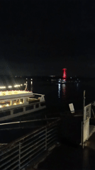 Evening stroll documented along illuminated Rhine waterfront in Emmerich