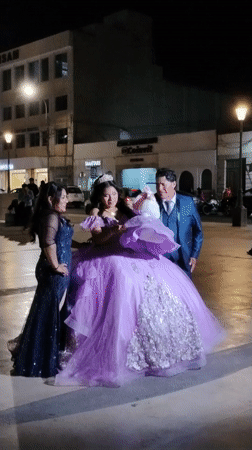 Quinceañera celebration captured in Tacna plaza at night