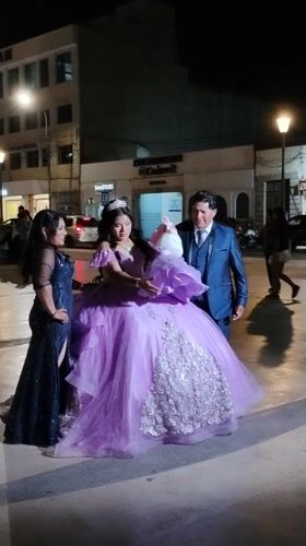 Quinceañera celebration captured in Tacna plaza at night