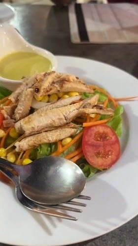 Mixed salad with grilled fish documented in Pattaya