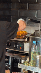 Chef grills steak, woman takes tea selfie in Khimki