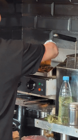 Chef grills steak, woman takes tea selfie in Khimki
