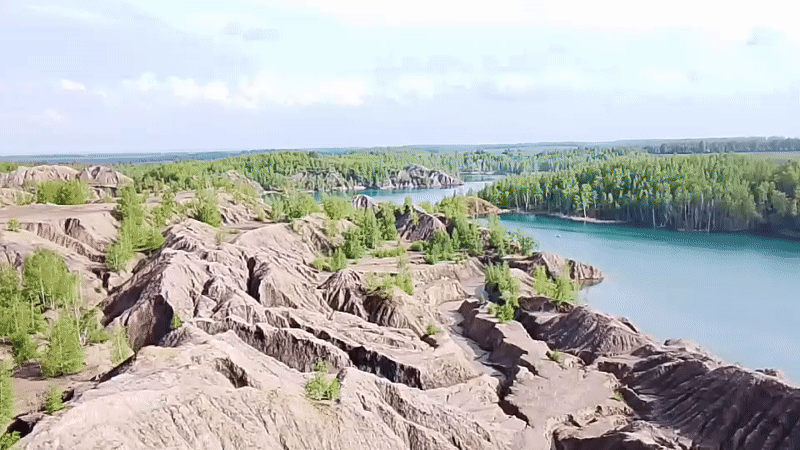 Turquoise water body observed from aerial view near Uzlovaya