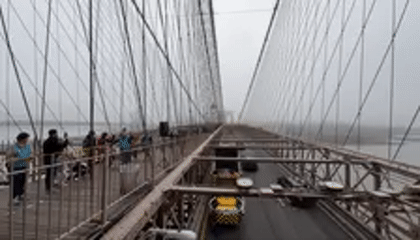 Pedestrians observed walking along Brooklyn Bridge walkway