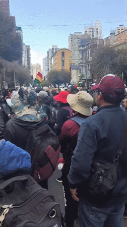 Large crowd gathers on La Paz streets, riot police present