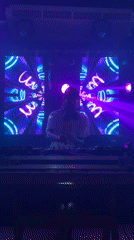 DJ set underway at an Arugam Bay club with neon visuals