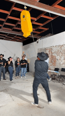 Early morning celebration with dancing and piñata in Puebla