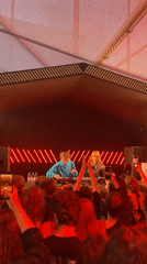 DJ performance at Saint Petersburg club with red stage lighting