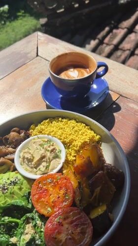 Breakfast documentation with Balinese architecture views in Kediri, Indonesia