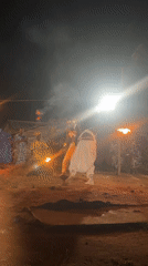 Traditional fire dance gathering documented by witnesses