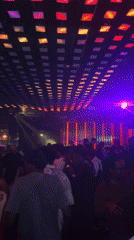 Nightclub scene captured in Kuala Lumpur with colorful lighting