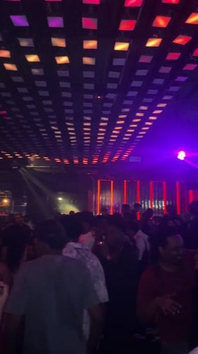 Nightclub scene captured in Kuala Lumpur with colorful lighting