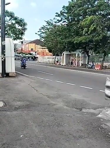 Early morning street scenes captured near Surakarta mosque